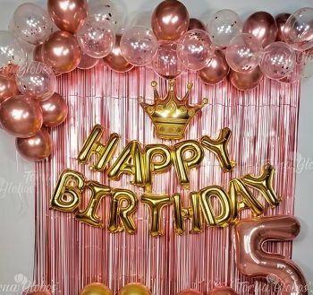 Happy birthday golden foil with rose gold curtains and balloons